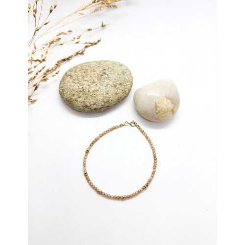 PULSERA DE ZIRCONITAS NUDE Y DONUTS ORO AMARILLO DE 18KT